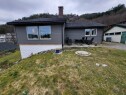 20250324 094506 Drenere 3 sider av hus,og jevne ut natursteinsmur bak i hage