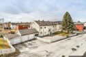Fasade Male fasade etter etterisolering og ny bordkledning