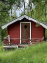 Hytta Snekring av trapp/veranda opp til en liten hytte
