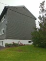 Skifting av panel Skifting av ca 48 m2 ytterveggpanel. Skifting av 6 vinduer innfelt i grunnmur.50x50 cm