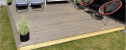 Inspirasjonsbilde   Platting rammet inn Lage 27,2m2 platting med 3-trinns trapp
